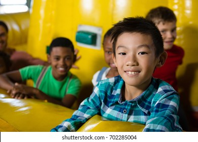 Children On Bouncy Castle During Party