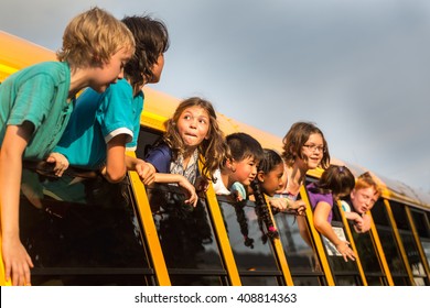 Children On The School Bus - Rowdy Kids Hanging Out The Window