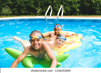 Children In Outside Swimming Pool