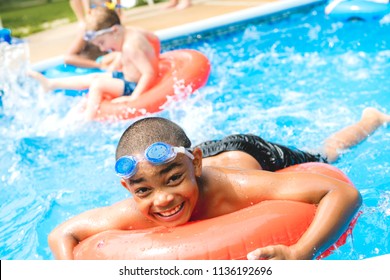 Children In Outside Swimming Pool