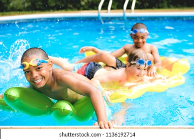 Children In Outside Swimming Pool