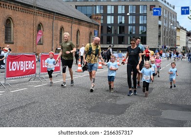 Children And Parents Running At A Children's Run Called 