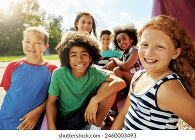 Children, park and portrait of group in summer to relax with friends on playground on vacation. Happy, holiday and kids together for party, games or smile outdoor at middle school on break at recess - Powered by Shutterstock