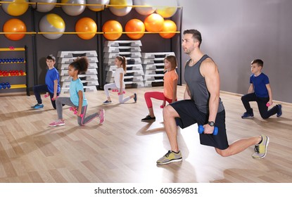 Children at physical education lesson in school gym