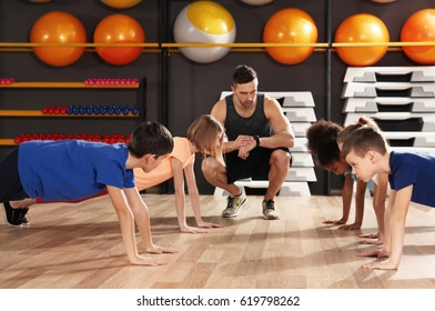 Children at physical education lesson in school gym