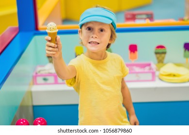 Children Play As Ice Cream Seller In The Ice Cream Shop