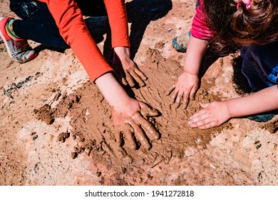 Children Play Mud Outside Without Worrying About Hygiene And Microbes