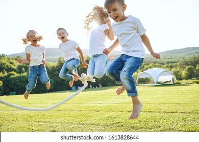 Children Play In Nature. Group Of Children.
