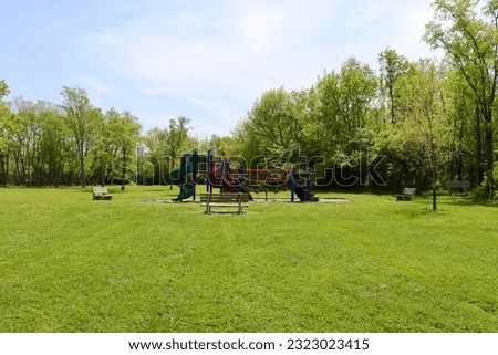The children playground area in the park on a sunny day.