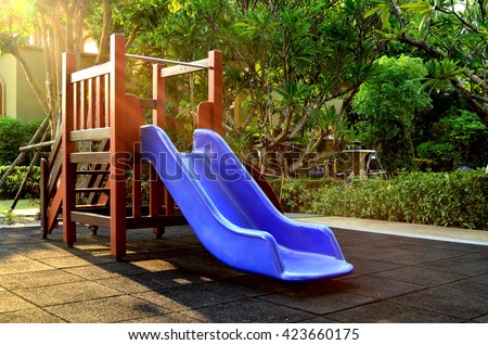 Children playground under sunlight - blue slider