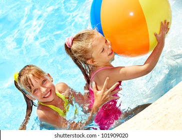 Children playing with ball in swimming  pool. - Shutterstock ID 101909020