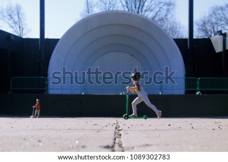 Children playing at the bandshell