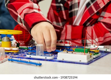 children playing with electronic constructor at studio