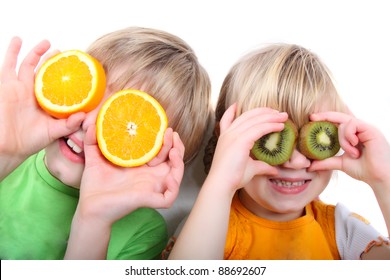 Children Playing With Fruit