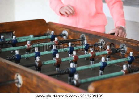 Similar – Image, Stock Photo Metal old foosball table with yellow and blue figurines