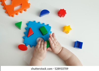 Children Playing With Montessori Toys, Educational Toys, Arranging And Sorting Colors And Sizes.