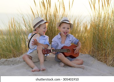 children playing music at the seaside
