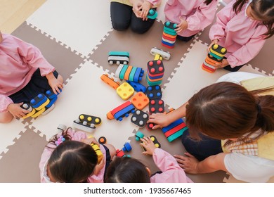 Children playing at nursery school - Shutterstock ID 1935667465