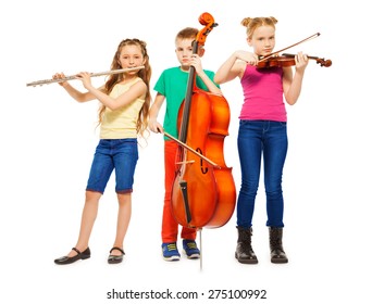 Children Playing On Musical Instruments Together