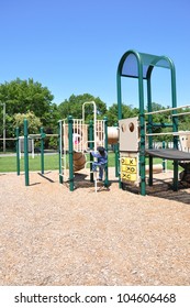 Children Playing On Outdoor Suburban Neighborhood Community Park Jungle Gym Playground Sunny Blue Sky Day