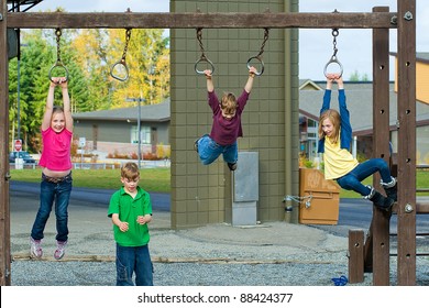 Children Playing On A School Playground During Recess.