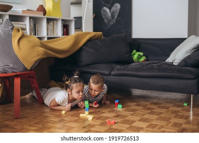 Children Are Playing Together At Home