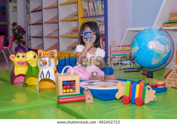 Children playing toy in\
library plaything for learning leads to future development .Sep\
11,2016 Thailand