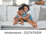 Children, portrait and siblings with smile, hug and bonding of family in living room, sofa and love. Embrace, couch and sister with brother, girl and affection for boy, care and happy in weekend