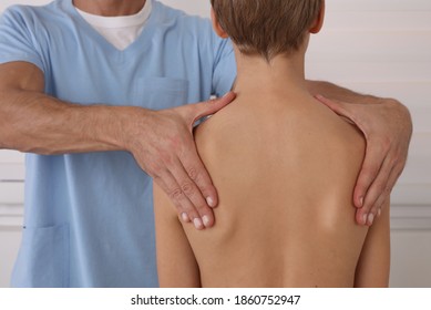 Children Posture Correction, Scoliosis examination . Chiropractic treatment, Back pain relief. Physiotherapy or Kinesiology - Shutterstock ID 1860752947