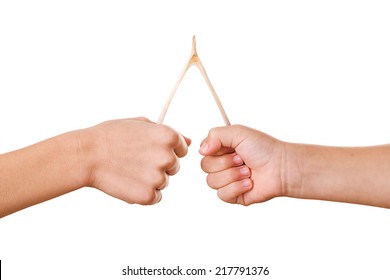 Children Pulling On A Turkey Wishbone