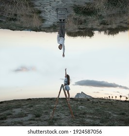 Children Reaching Between Two Worlds.