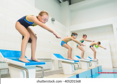 Children Ready To Jump Into Sport Swimming Pool. Sporty Kids