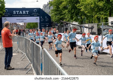 Children Running Shortly After The Start Of A Children's Run Called 