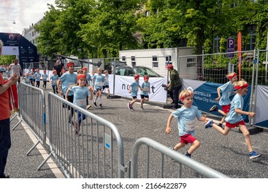 Children Running Shortly After The Start Of A Children's Run Called 