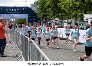 Children Running Shortly After The Start Of A Children's Run Called 