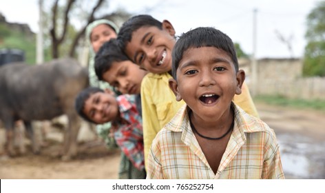 Children from rural India smiling and having good time