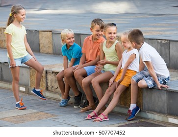 Children In School Age Playing Charades Outdoors