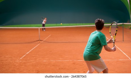 Children At School During A Dribble Of Tennis