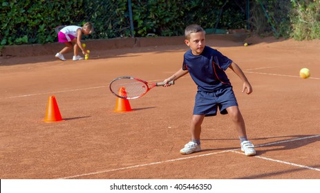 Children At School During A Dribble Of Tennis