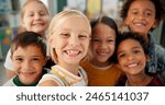 Children, school and happy in class selfie, student and fun with group for childcare development and growth and smile. Fun, diversity and bonding with friends or peers, learn environment or classroom