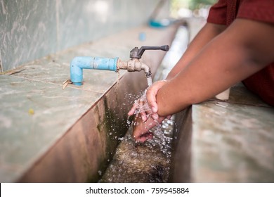 Children Or Students Are Washing Their Hands In The Sink Before Having Lunch At The School Cafeteria. For Good Health Stay Away From COVID 19 And Other Diseases.
Water Splashes, Health Concept