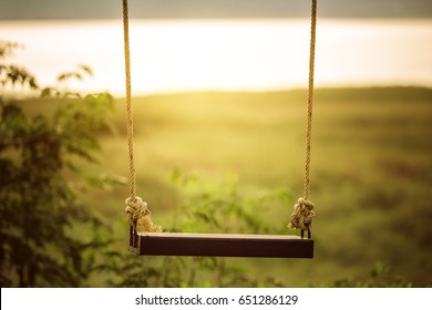 Children swing in the park (vintage tone) - Shutterstock ID 651286129