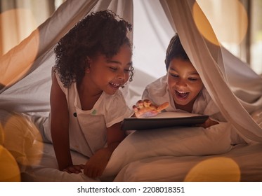 Children, Tablet And Night Streaming Online For Movies, Cartoon Or Educational Games Before Bedtime In A Blanket Fort With A Fun App. Excited Boy And Girl Kid Sharing, Reading And Internet Addiction