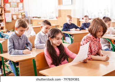 Children taking an exam