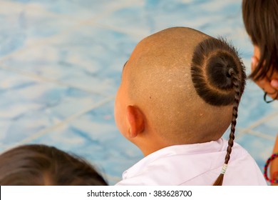 children are topknot in back