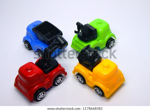 children toys colorful plastic\
vehicle model of excavator, concrete mixer, dump truck, mobile\
crane