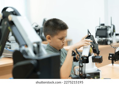 Children using the hand robot technology, Students are studying technology, which is one of the STEM courses.