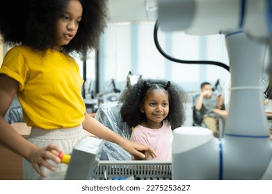 Children using the hand robot technology, Students are studying technology, which is one of the STEM courses.