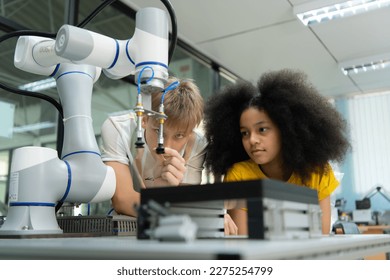 Children using the hand robot technology, Students are studying technology, which is one of the STEM courses.