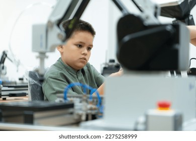 Children using the hand robot technology, Students are studying technology, which is one of the STEM courses.